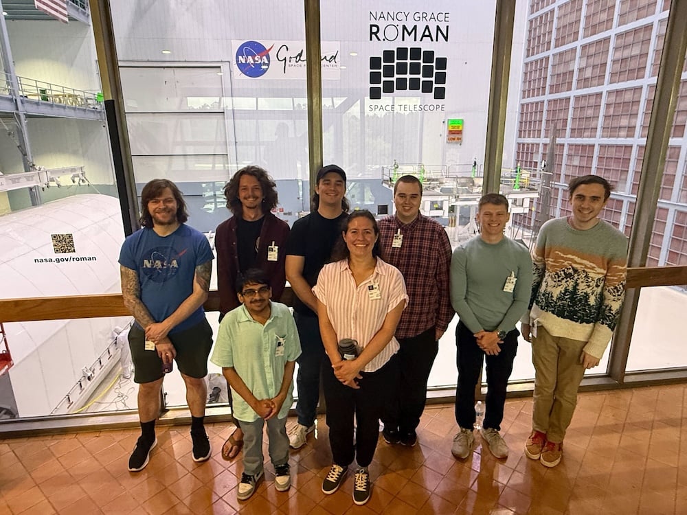 Students pose with Dr. Suzanne Taylor at NASA.