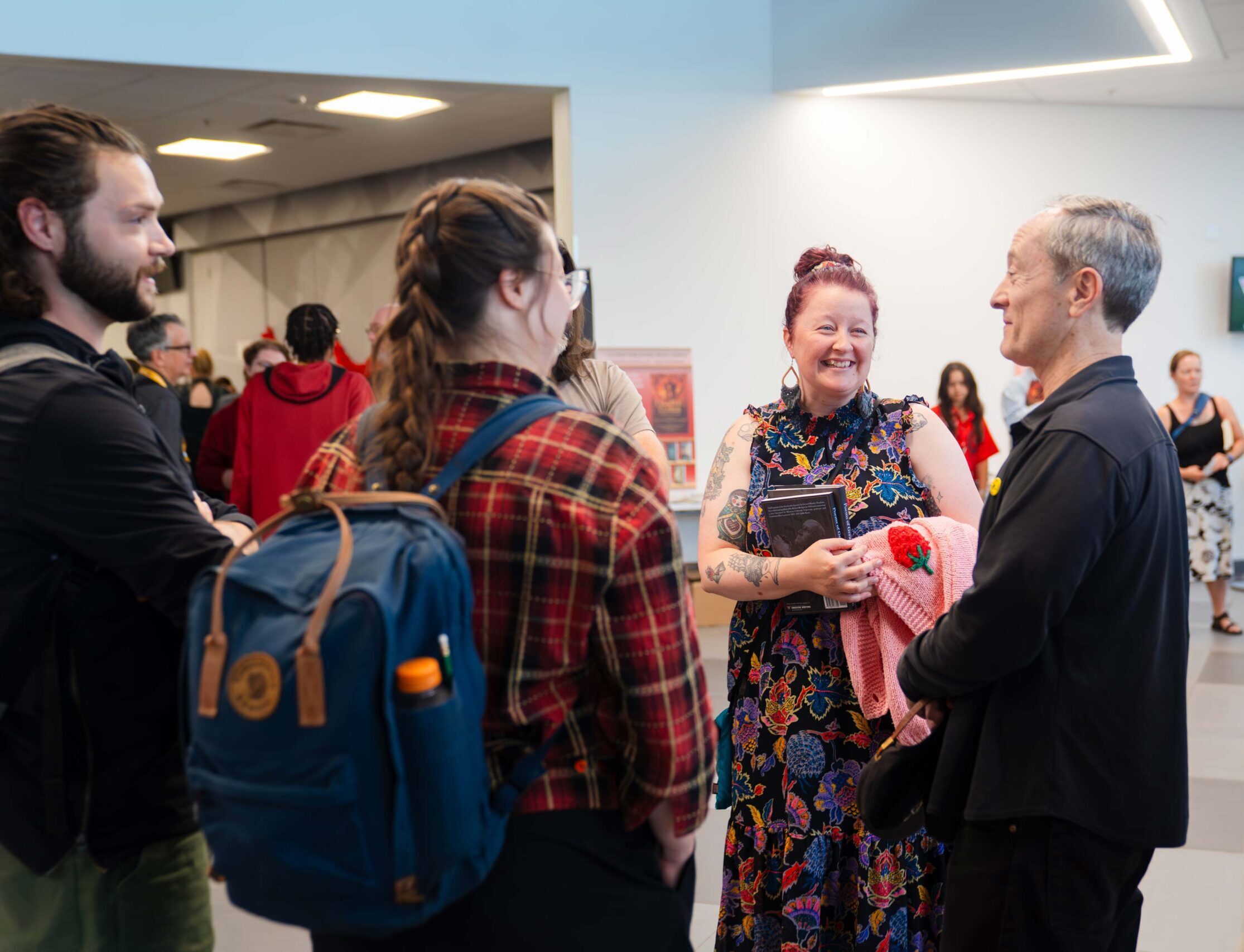 GPCW faculty and students socialize at the GPCW publishing event,