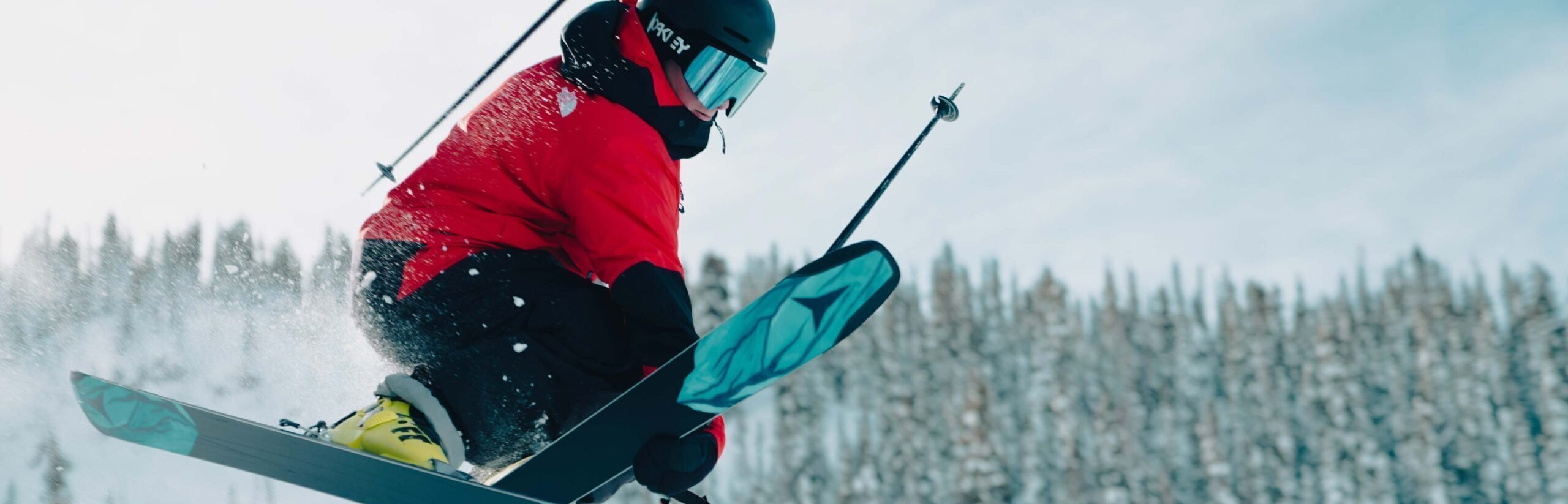 Western student hits a jump skiing at crested butte mountain resort