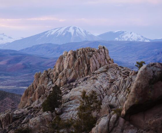 Hartman Rocks with mountain views at sunset.