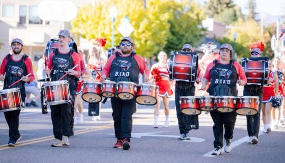 The drumline marches down Gunnison's main street during the Homecoming parade.