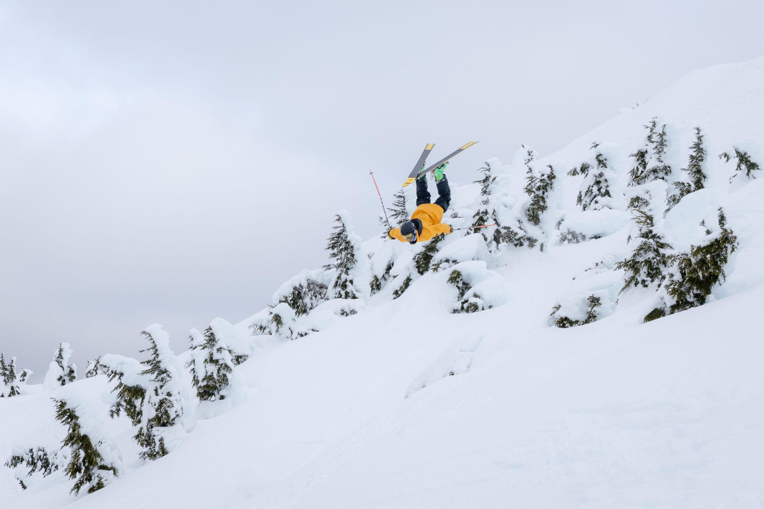 A freeride athlete does a backflip at Eaglecrest Ski Area in Juneau, Alaska