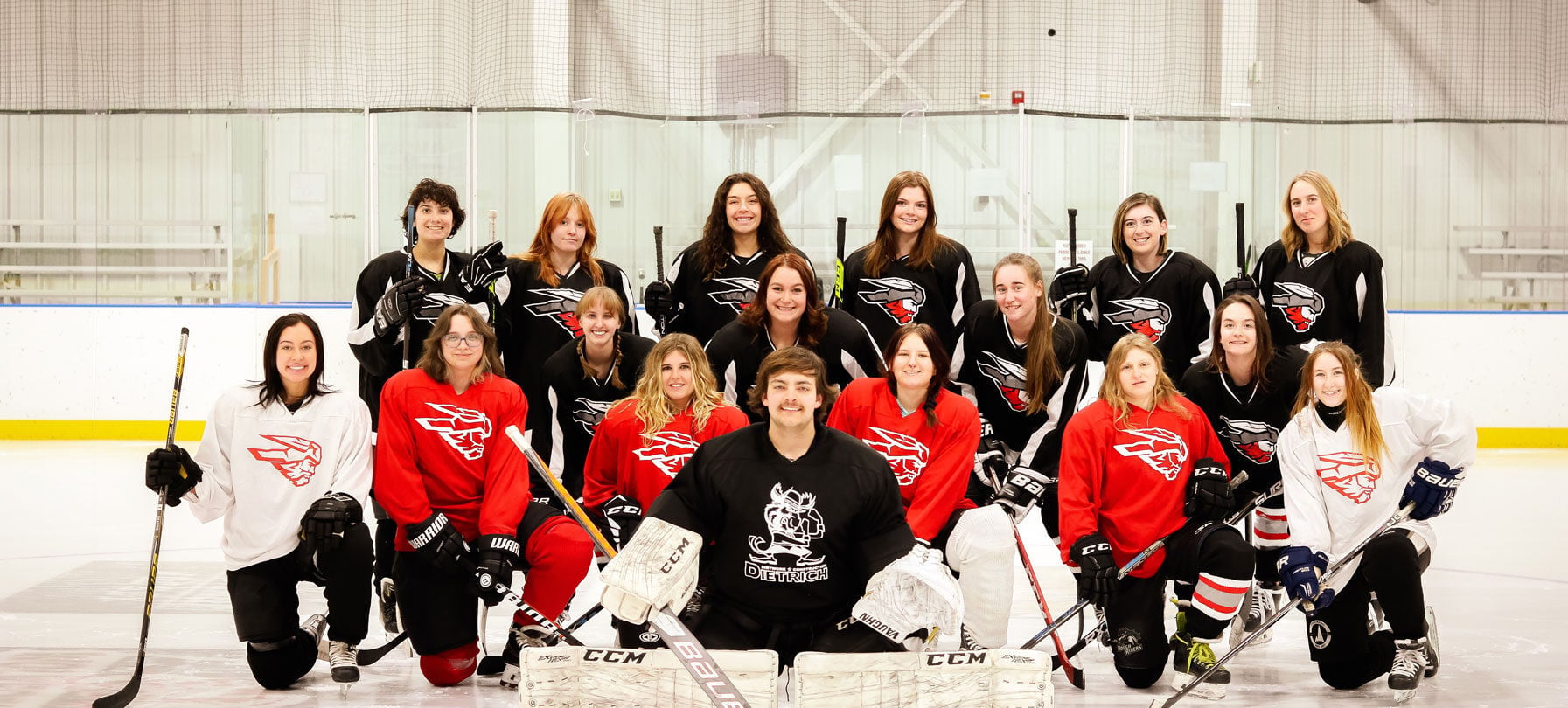Women's Hockey Team on the rink.