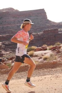 Bayden Menton runs up the final climb in the Moab Trail Half Marathon.