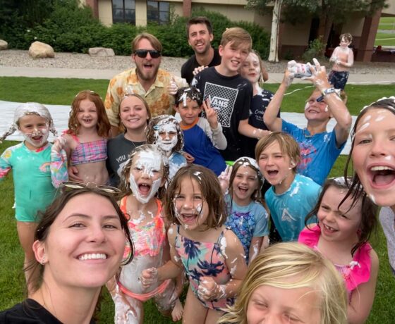 Group selfie of kids and staff attending a Junior Mountaineers summer camp.