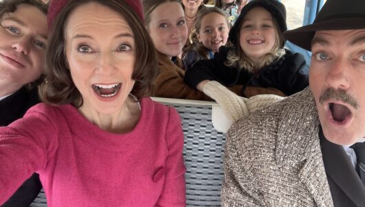 Steven Cole Hughes on set with fellow actors.