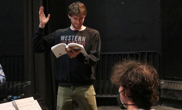 A student practices his lines with a pianist.