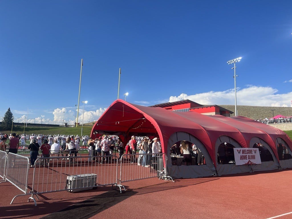 The alumni zone tent at the Mountaineer Bowl.