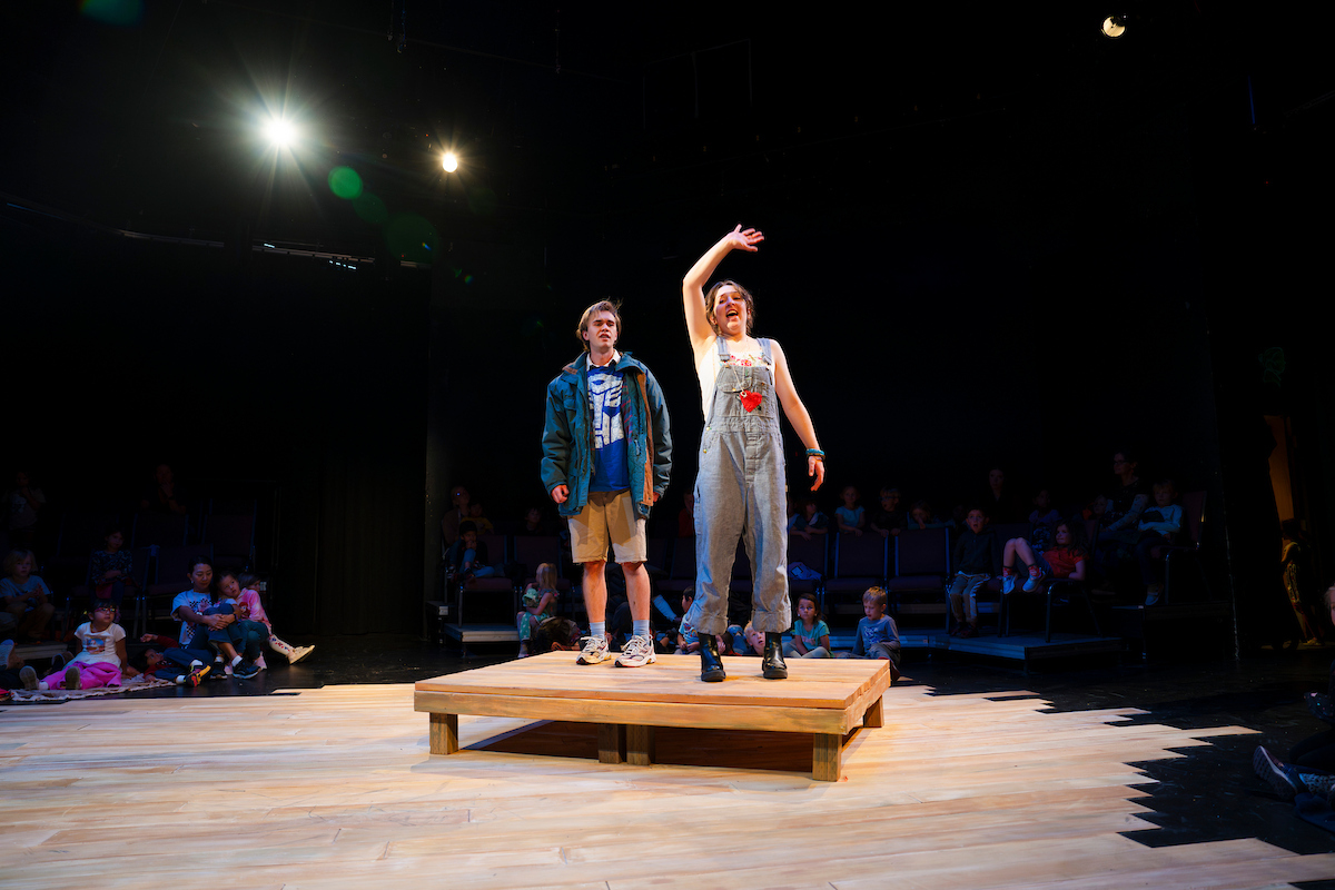 Two student actors perform a scene between a mother and her son after a large storm for Western Theatre Co's production of 'LOVE'.