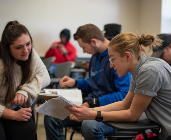 Sociology students come together to study before class for their exams.
