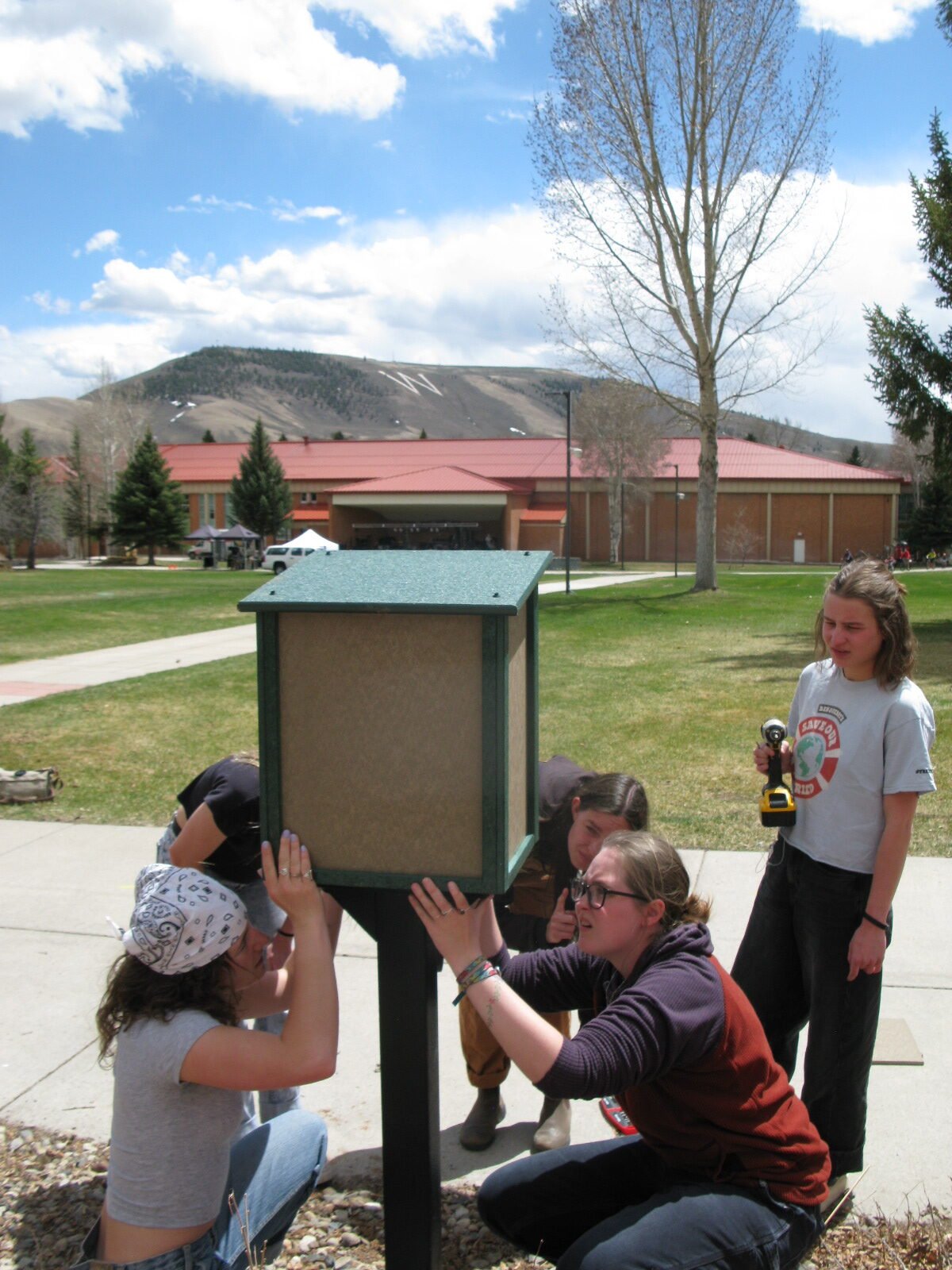 Students installing the Little Library.