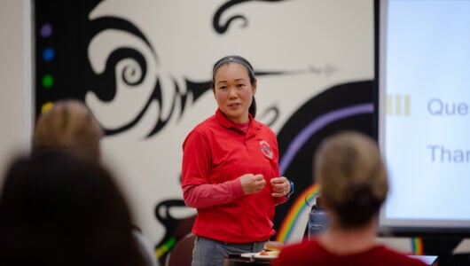 Kanae Haneishi presents about her two projects on JEDI in Physical Education to a group of faculty and staff during a session of Lunch with Western Scholars in the library's Mural Room.