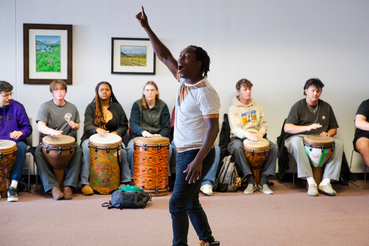 Fara Tolno leads students in a drum circle for his annual West African Drumming & Cultural Exchange workshop.