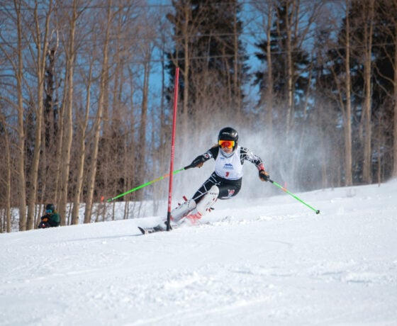 A skier races downhill during a competition at Crested Butte Mountain Resort
