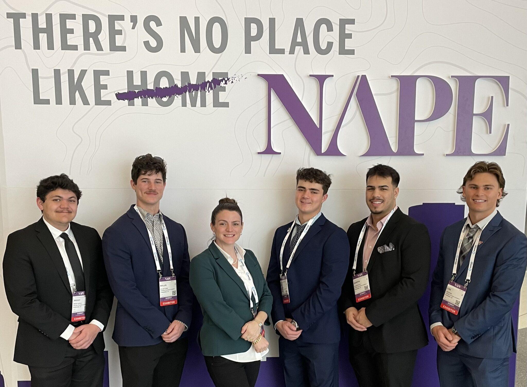 NAPE 2025 Students and Professor Richardson pose together for a picture at the event
