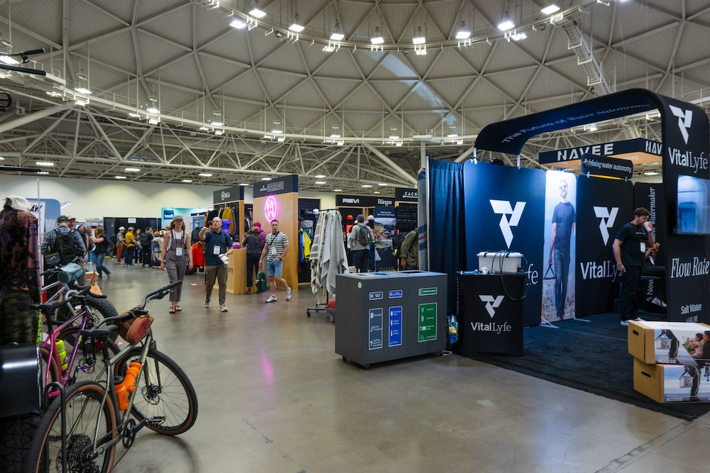 Booths are displayed at Outdoor Retailer 2026 in a convention center.
