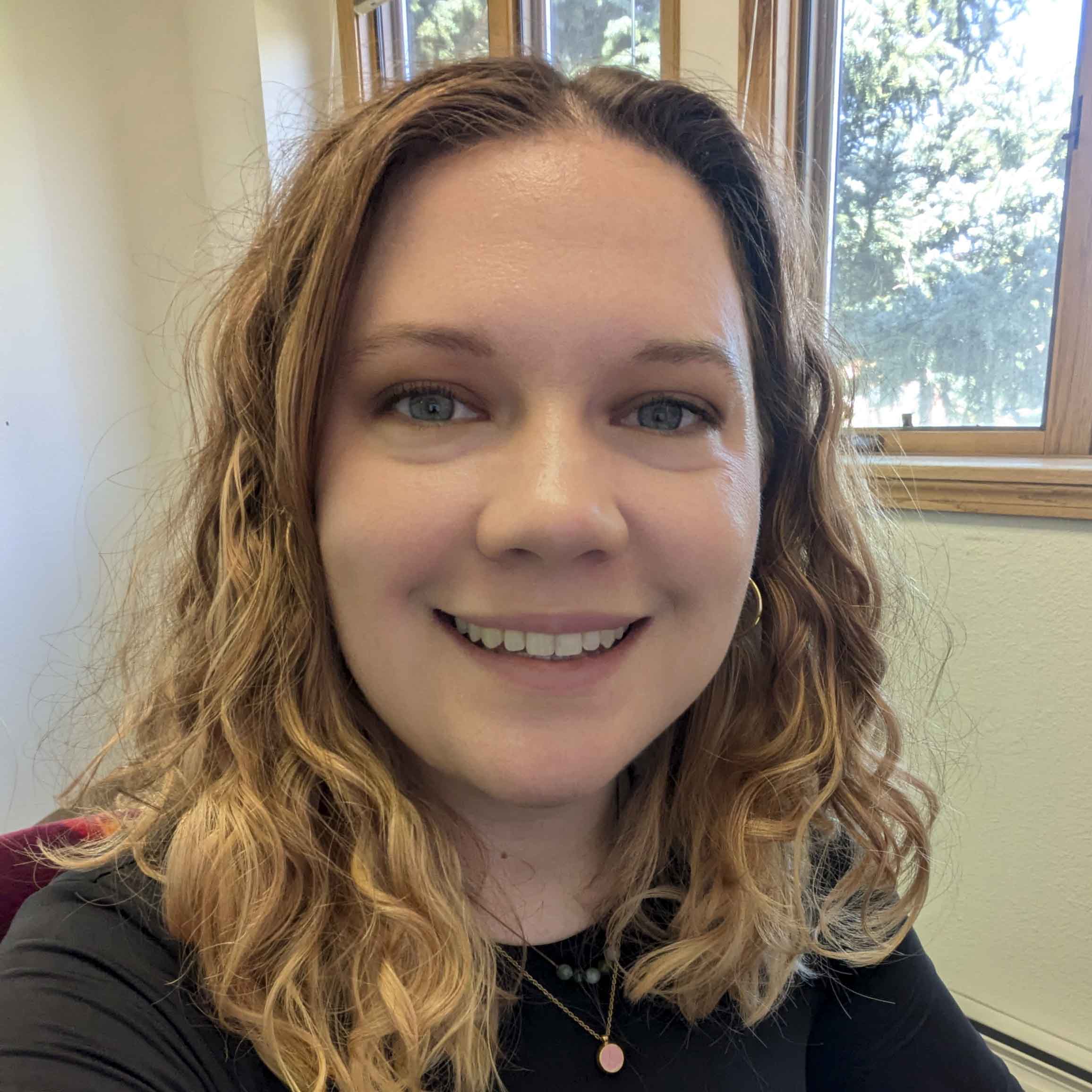 Headshot of Shana Lusk.