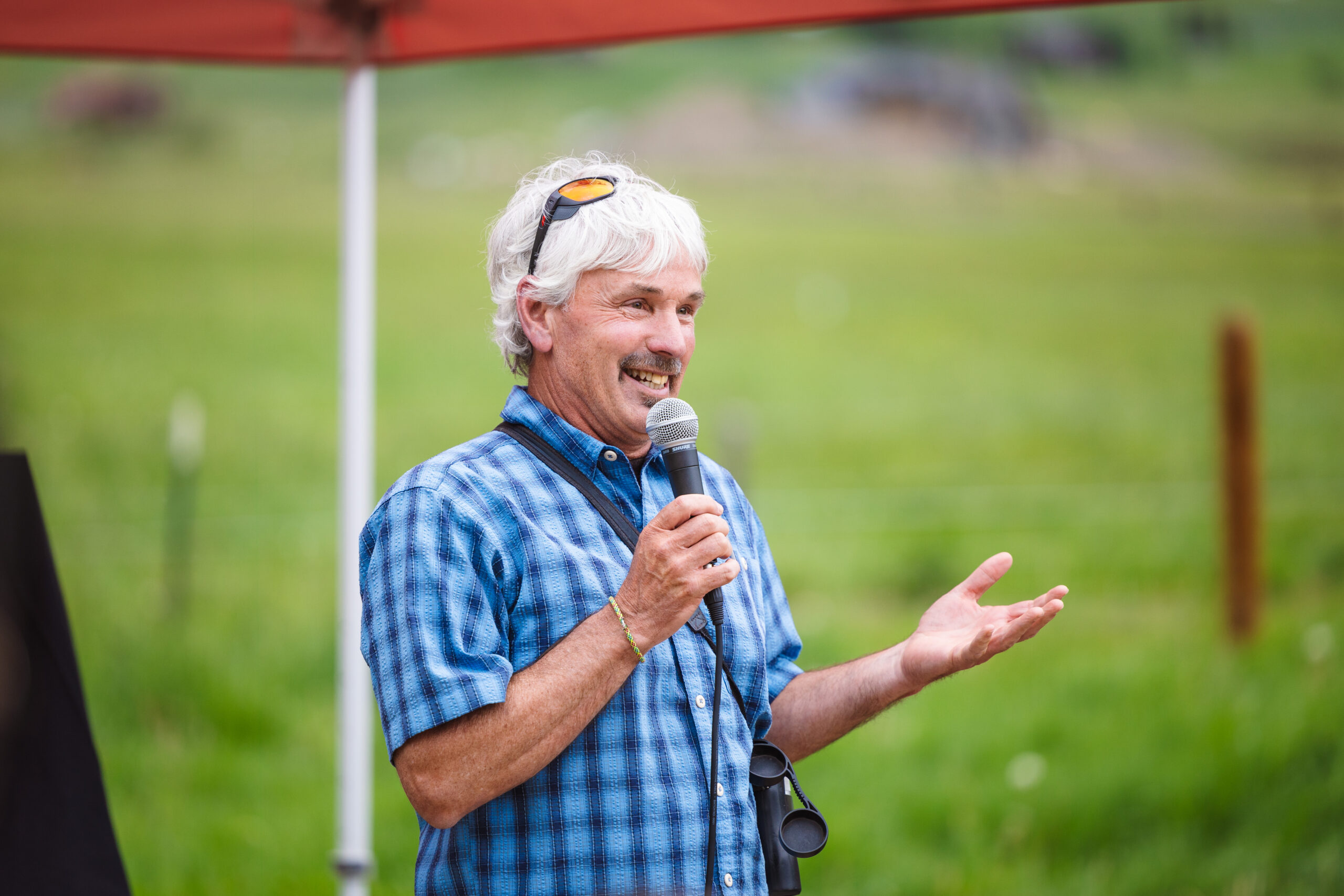 Professor Pat Magee gives a speech during the Verzuh Ranch sign unveiling ceremony.