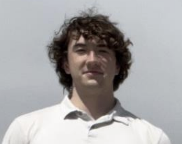 Headshot of Thomas Rathman.