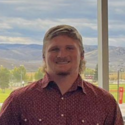 Headshot of Zayne Stam.