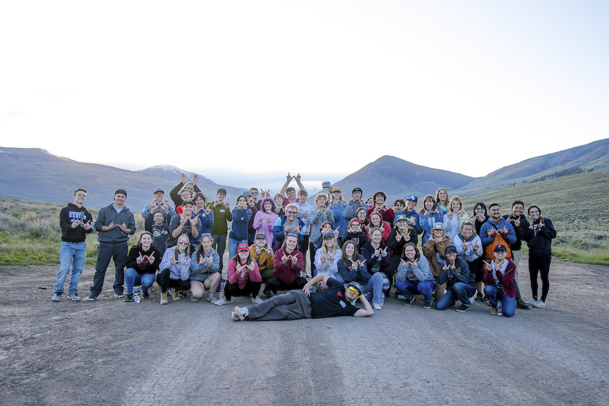 A group photo of deposited students after the sunset hike during Summit Western.