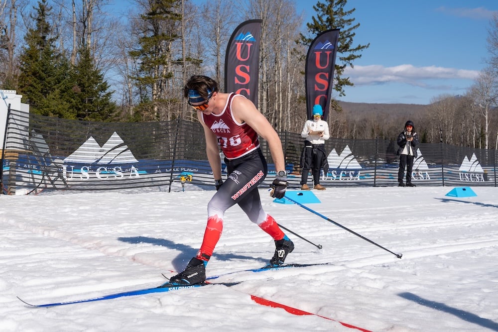 A Western Nordic Ski Team member skis on the course at the competition.