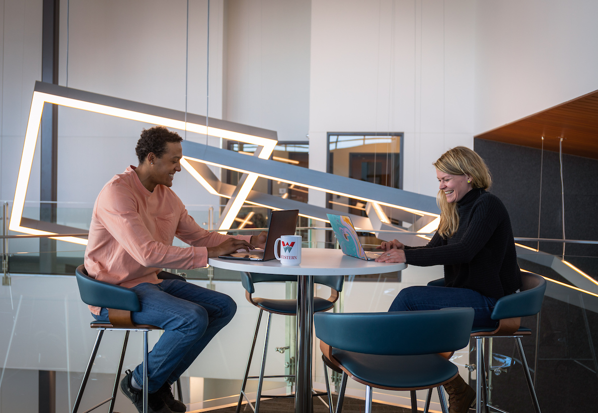 Two students study together in the Paul M. Rady School of Computer Science & Engineering.
