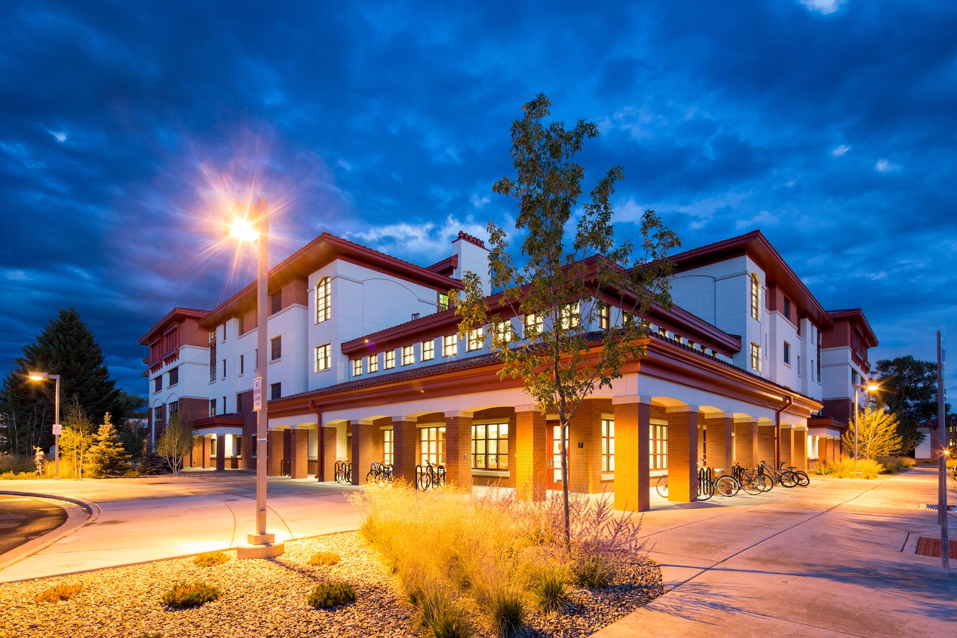 The Pinnacles Apartments exterior at blue hour.