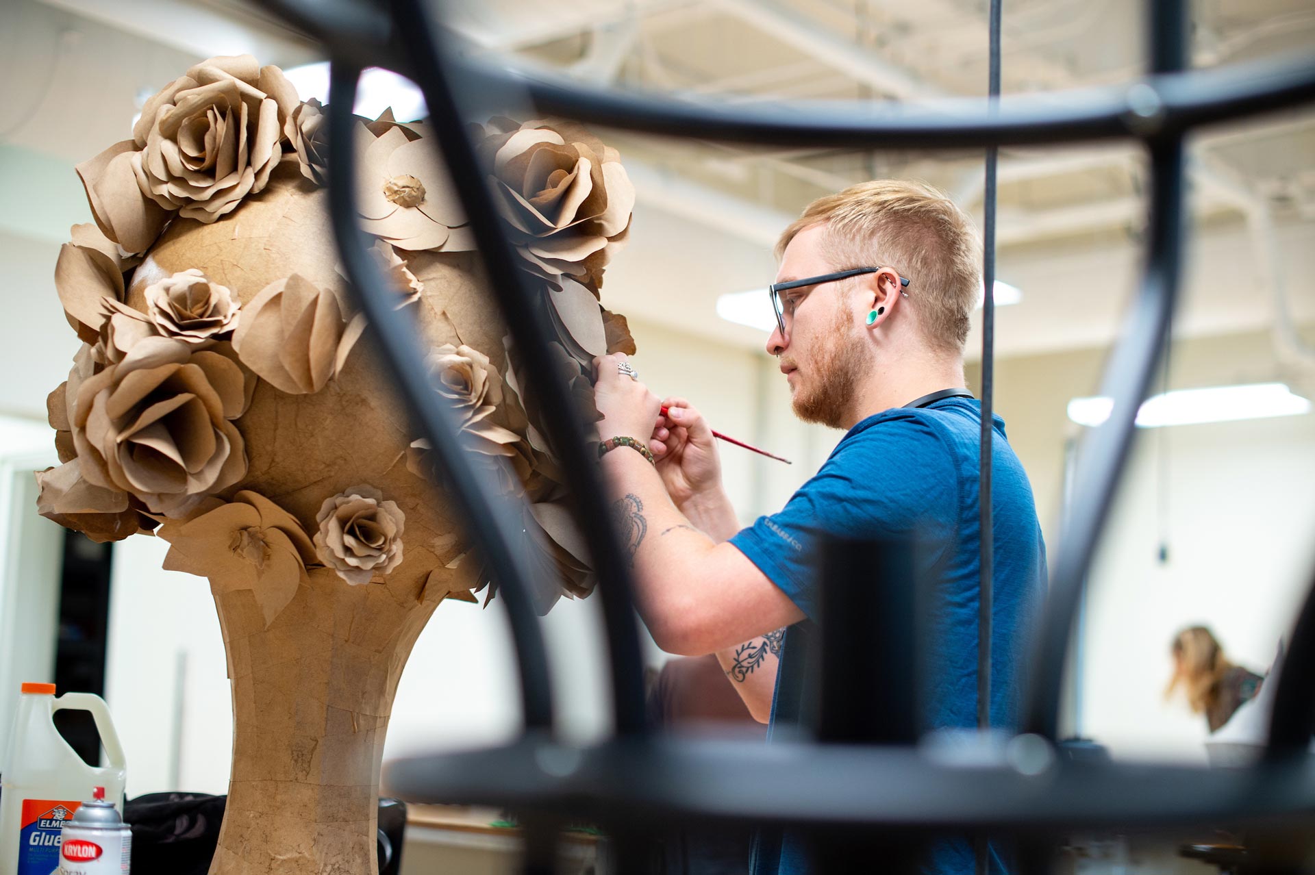 A student works on a sculpture.