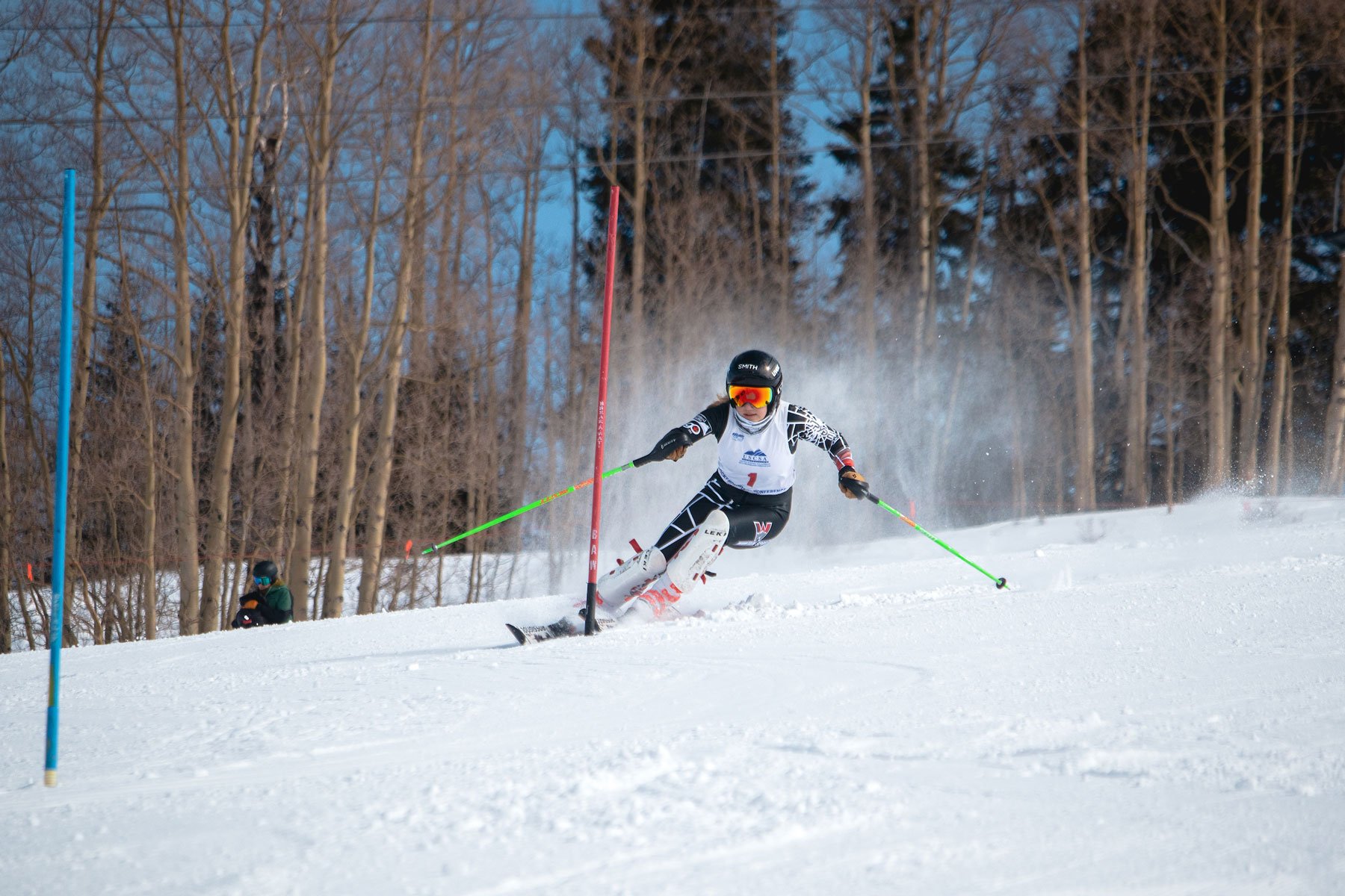 A skier races downhill during a competition at Crested Butte Mountain Resort.