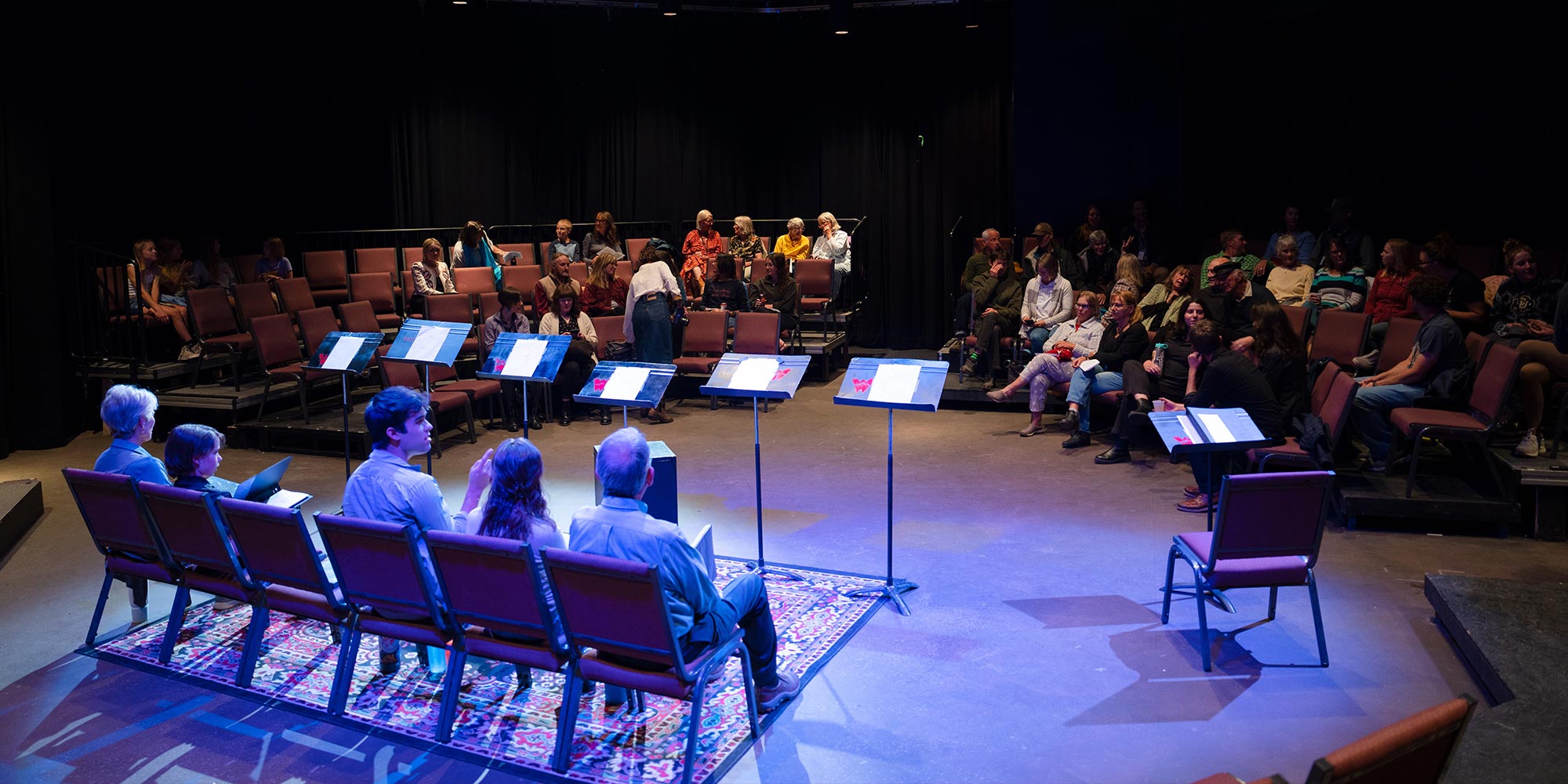 Cast of the 'The Koi Pond' facing audience in the studio theatre