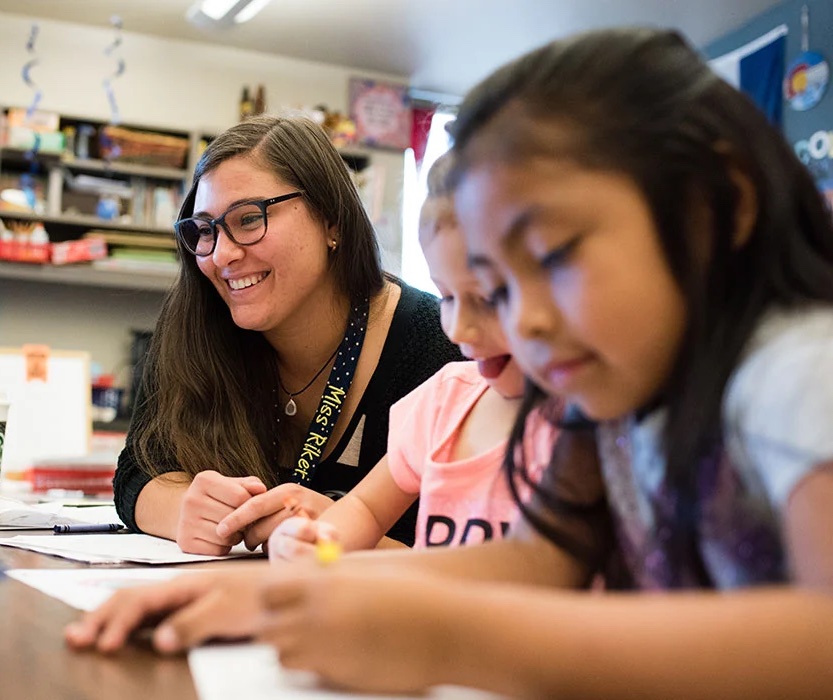 Student teacher Alyeska Riker helping students at the Gunnison Lake School