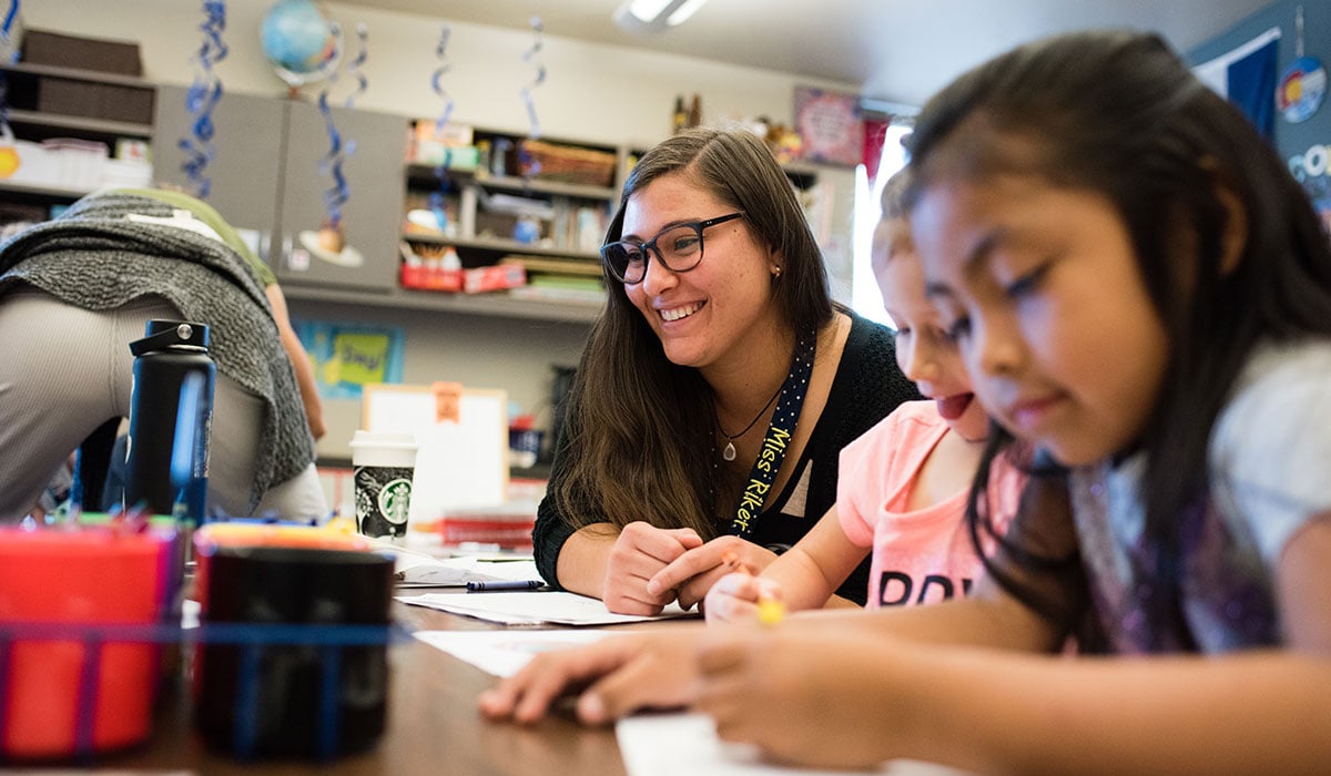 Student teacher Alyeska Riker helping students at the Gunnison Lake School