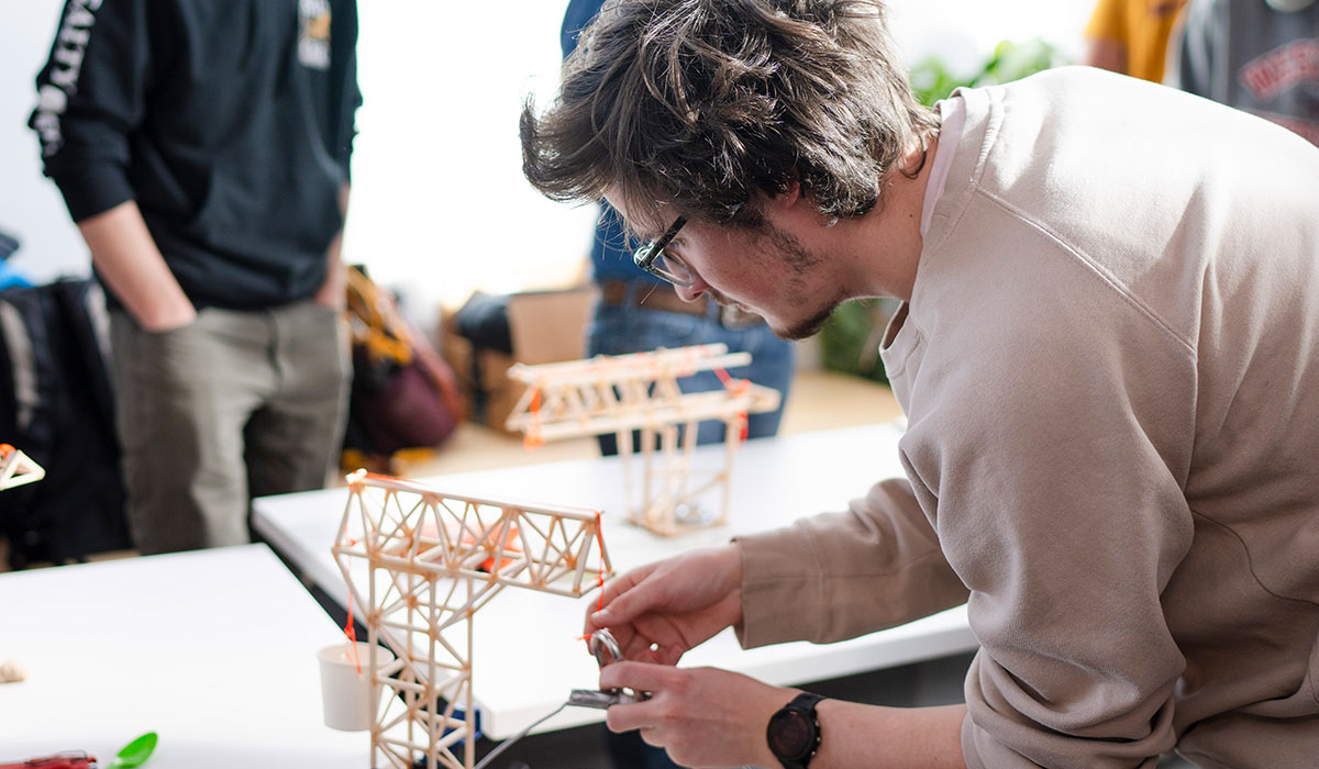 Engineering students working on a project in the Makerspace