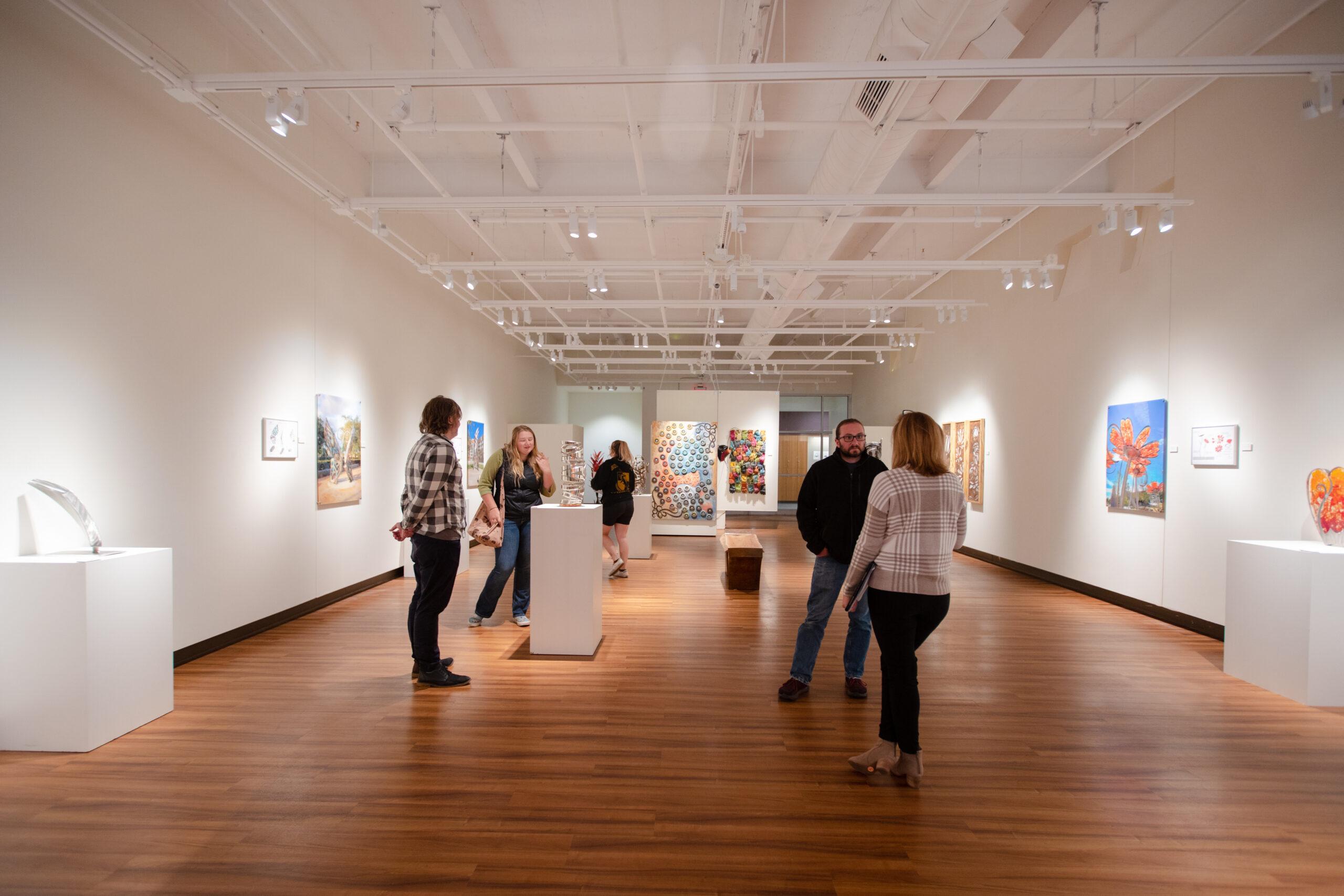 A wide view of the Quigley Gallery during the monthly art convocation event.