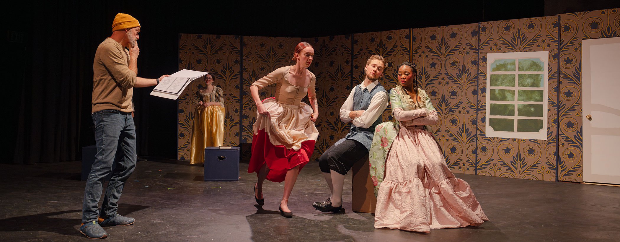 Steven Cole Hughes directs actors during the Tartuffe dress rehearsal