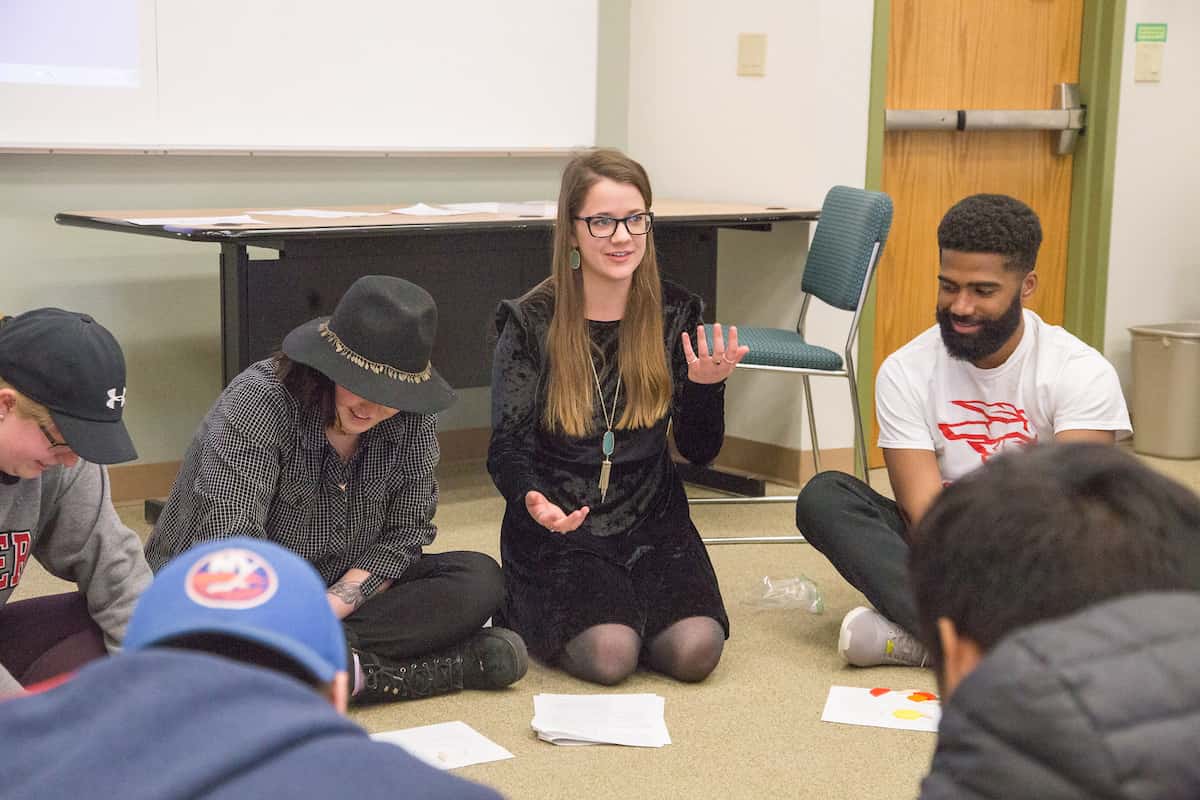 Early childhood special education graduate programs: students engaging in an activity during class