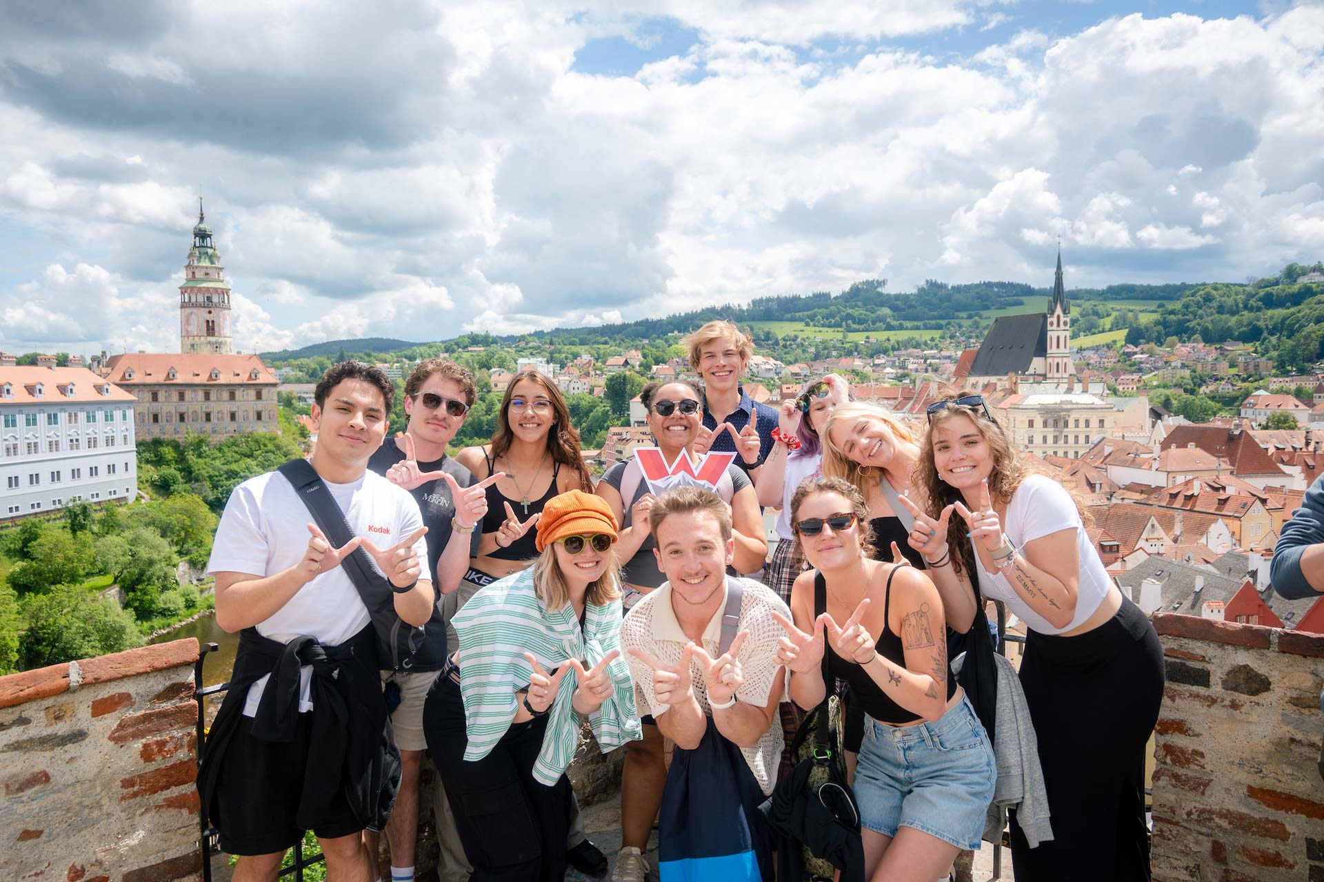 Group photo of a study abroad class in Europe making the 