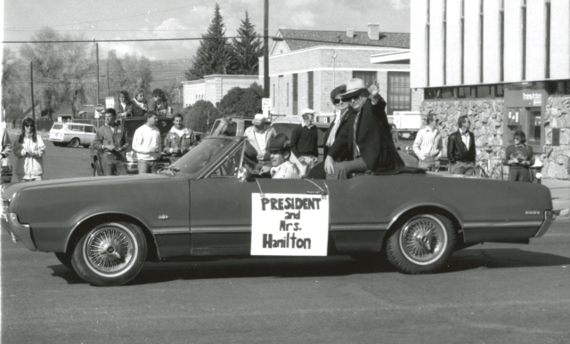 WSC President and Mrs. William Hamilton in the Homecoming parade, ca. 1990.